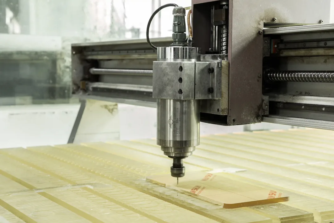 CNC machining of cast PMMA mahjong tile bodies